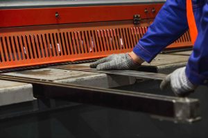 Cutting Sheet Metal In Large Hydraulic Guillotine Shears